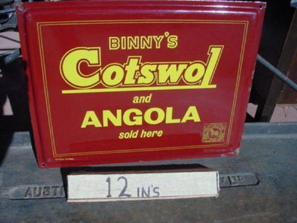 Binnys Cotswol + Angola Fabrics sold here enamel sign