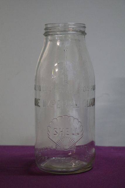 Early Australian Shell Embossed Quart Oil Bottle