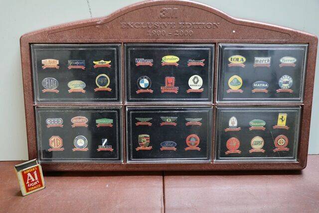 A Set of 36 Cased 3M Exclusive Edition 19002000 Car Badges 