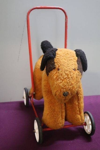 A PushAlong Soft Toy Dog On Wheels 