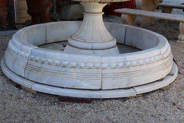 A Round White Marble Pond Base and Surround