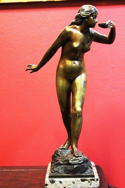 A Stunning Bronze Nude Figure of a Woman