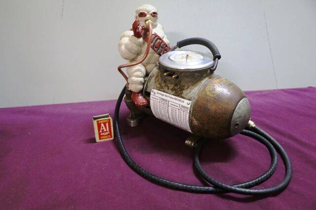 A Vintage Michelin Bomb Compressor 