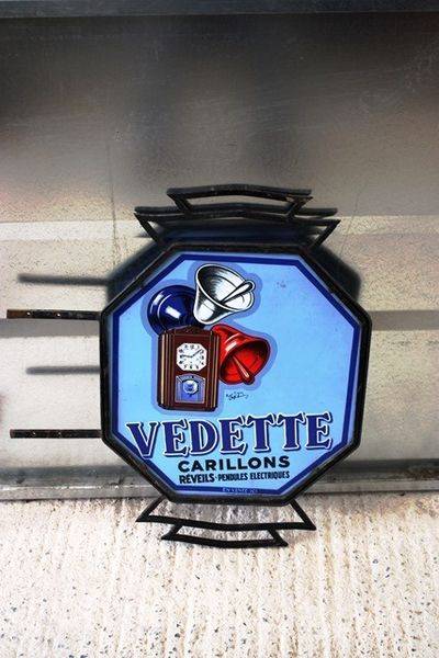 Vedette Wall Clock Double Sided Enamel Sign Arriving Nov