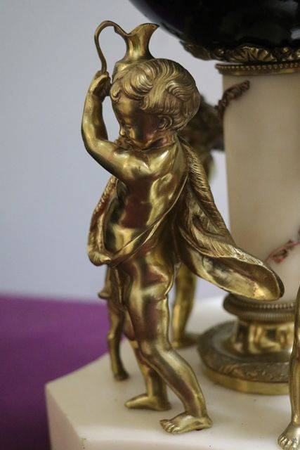 French Bell Strike Clock In Round Black Ball On top Of Cherubs 