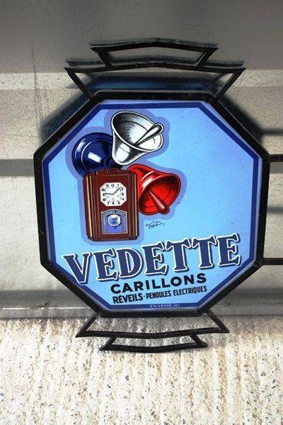 Vedette Wall Clock Double Sided Enamel Sign Arriving Nov