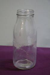 Early Australian Shell Embossed Quart Oil Bottle