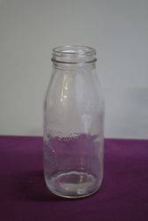 Early Australian Shell Embossed Quart Oil Bottle