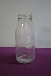 Early Australian Shell Embossed Quart Oil Bottle