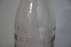 Early Australian Shell Embossed Quart Oil Bottle