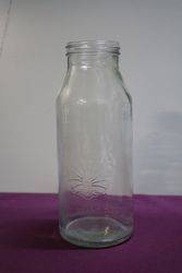 Early Australian Shell Embossed Quart Oil Bottle