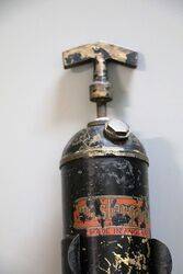 Vintage Masterpiece Fire Extinguisher and Bracket 