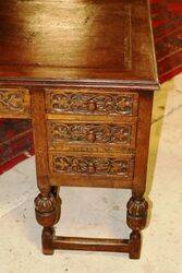 Early C20th Carved Oak 7 Drawer Writing Desk