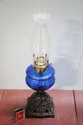 Antique Kerosene Lamp on Cast Iron Base 