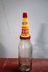 Early Shell One Quart Bottle with X100 Tin Top and Dust Cap