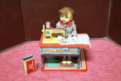 1950s Japanese TN Co Tinplate Dolly Dressmaker Toy