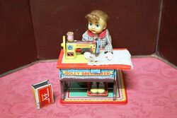 1950s Japanese TN Co Tinplate Dolly Dressmaker Toy