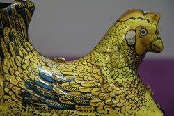 A Baldwin MFG Company Clockwork Tinplate Model Of A Hen Nesting 