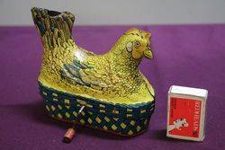 A Baldwin MFG Company Clockwork Tinplate Model Of A Hen Nesting 