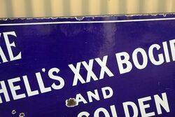 A Early Smoke Mitchelland39s XXX Bogie Roll Enamel Sign 