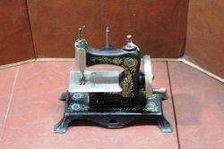 A German Casige No13 Tin Plate Miniature Sewing Machine