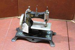 A German Casige No13 Tin Plate Miniature Sewing Machine