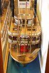 A Large Cased Model Of A River Paddle Steamer