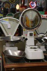 A Large Set Of White Enamel And Mirrored Avery Shopkeepers Scales 