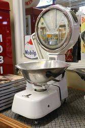 A Large Set Of White Enamel And Mirrored Avery Shopkeepers Scales 