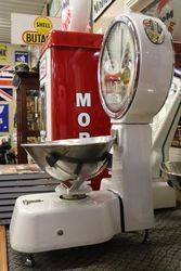 A Large Set Of White Enamel And Mirrored Avery Shopkeepers Scales 