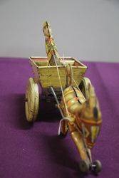 A Mark Toys Clockwork Tinplate Model Of A Donkey Pulling A Cart  