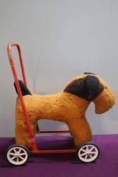 A PushAlong Soft Toy Dog On Wheels 