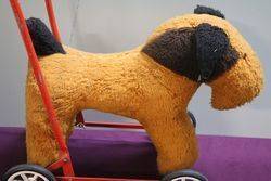 A PushAlong Soft Toy Dog On Wheels 