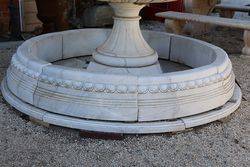 A Round White Marble Pond Base and Surround