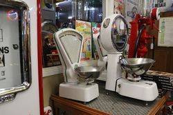 A Set Of White And Green Embellished Avery Shopkeepers Scales 