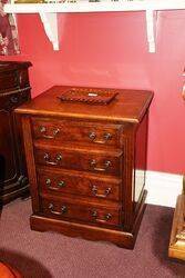 A Small C20th Oak File Cabinet 