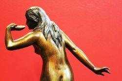 A Stunning Bronze Nude Figure of a Woman