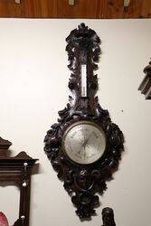 A Very Large Antique profusely carved oak barometer 