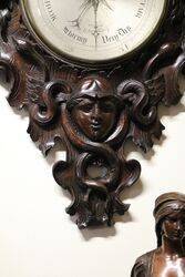 A Very Large Antique profusely carved oak barometer 