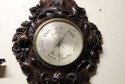 A Very Large Antique profusely carved oak barometer 