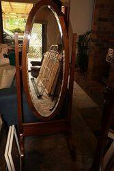 A Vintage Oval Beveled Glass Cheval Mirror 