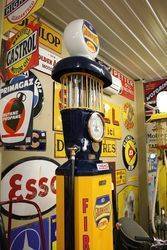 A Well Restored Themis Deluxe Petrol Pump In Golden Fleece Livery