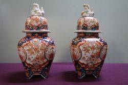 Antique Pair of Imari Vases With Foo Dog Lids  