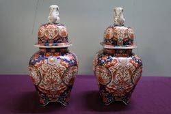 Antique Pair of Imari Vases With Foo Dog Lids  