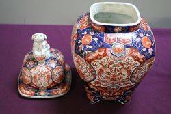 Antique Pair of Imari Vases With Foo Dog Lids  