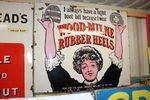 Antique Wood Milne Rubber Heels Pictorial Enamel  Sign