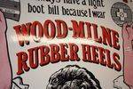 Antique Wood Milne Rubber Heels Pictorial Enamel  Sign