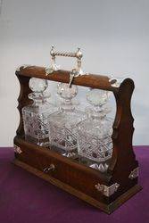 Cut Glass 3 Bottle Tantalus Housed in a Lockable Oak Case 