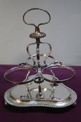 Cut Glass 3 Bottle Tantalus in a Silver Plated Stand
