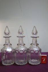 Cut Glass 3 Bottle Tantalus in a Silver Plated Stand